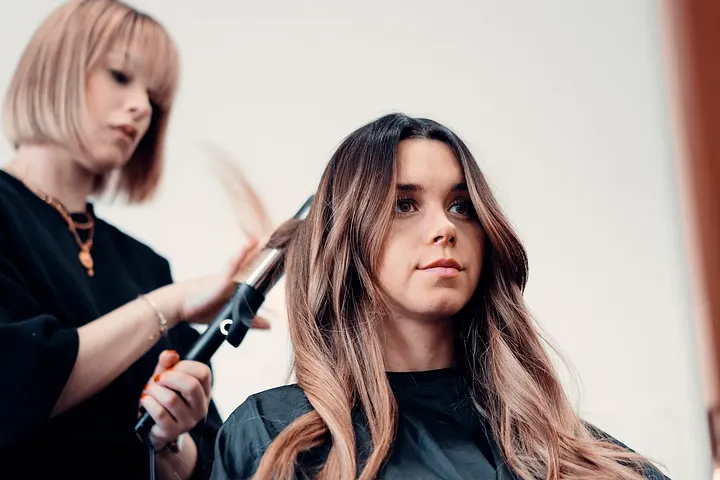 What are the benefits of starting a salon loyalty program?